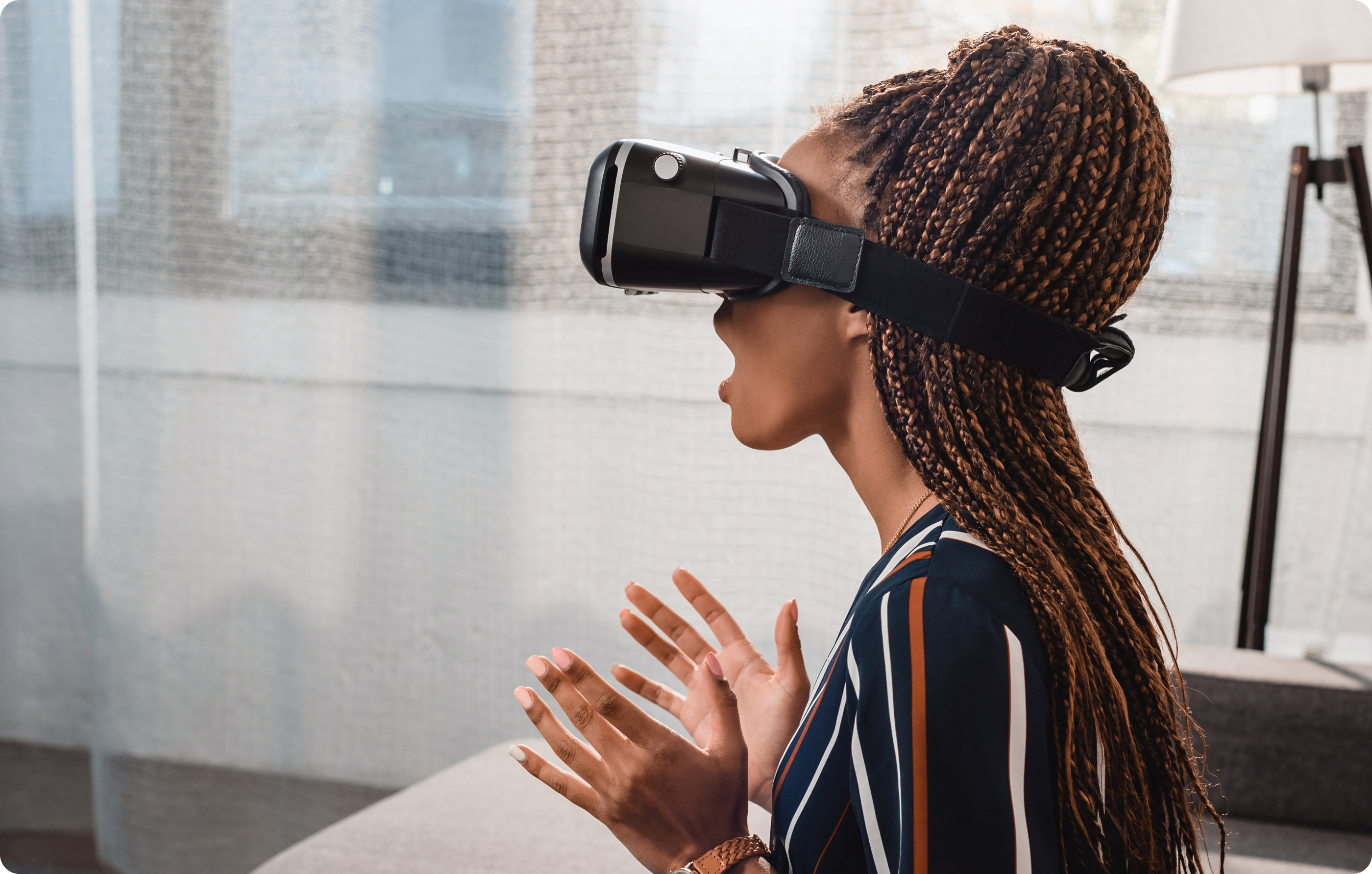 Woman exploring a virtual experience through a VR headset